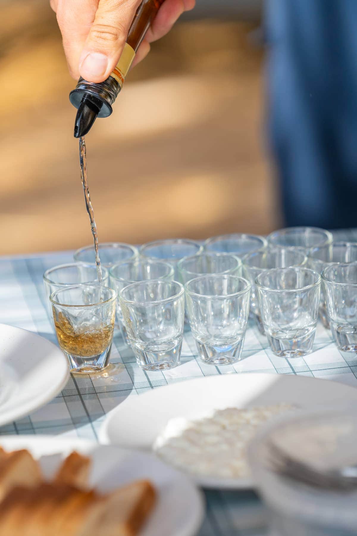 Raki poured for a tasting at a Cretan farm